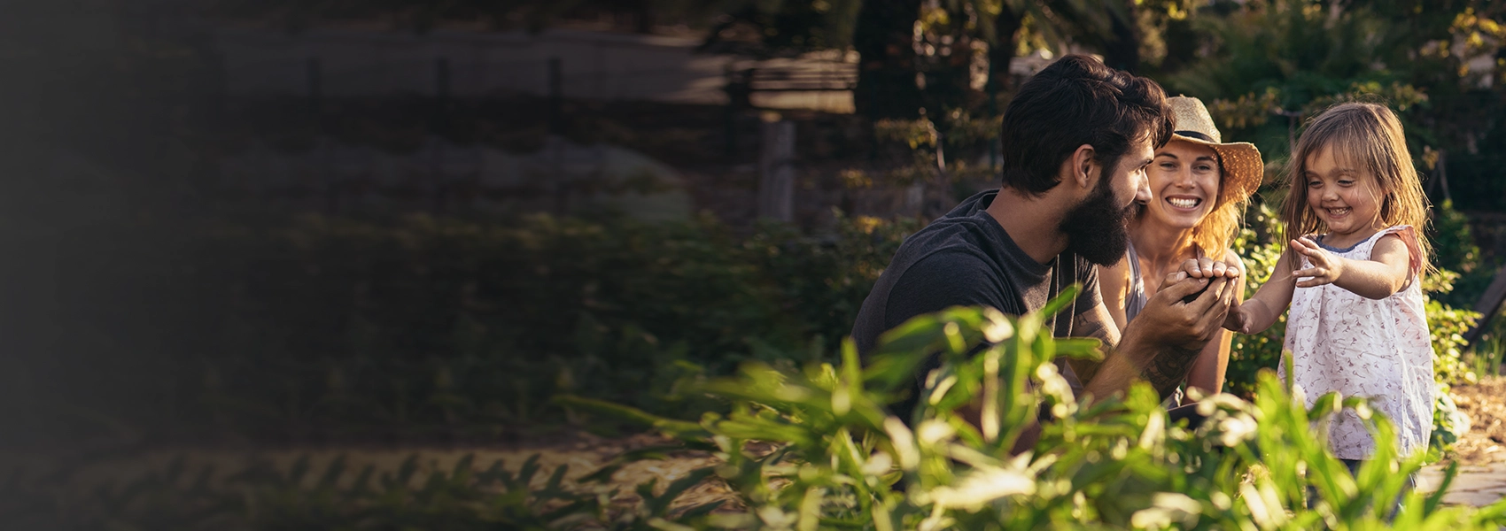 Family walking through a garden together