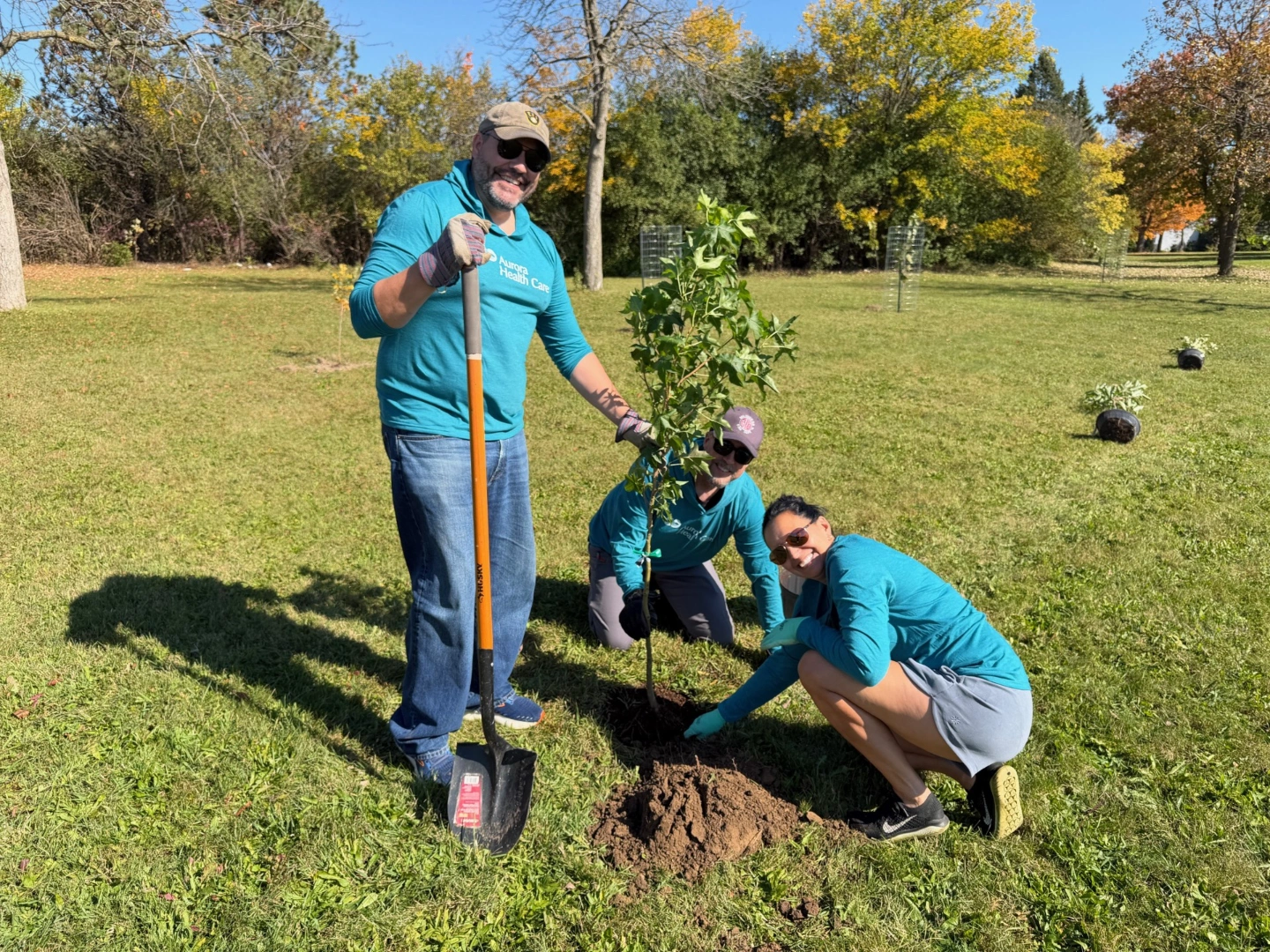 Aurora Health members planting trees in Milwaukee