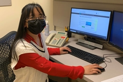 Virtual volunteer at computer