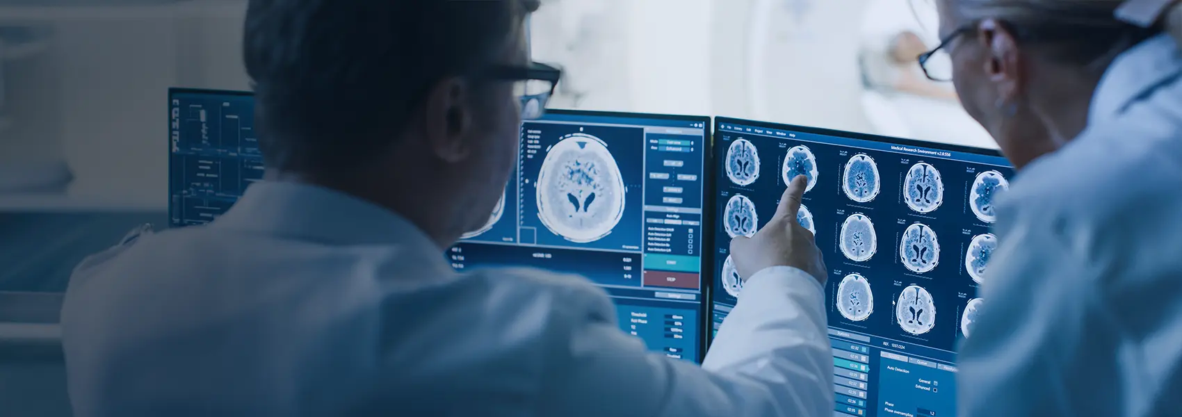 Neurologists viewing a brain scan