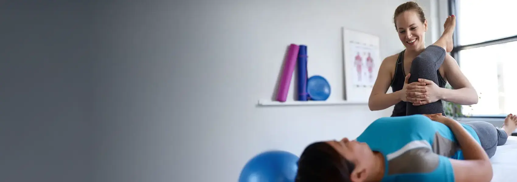 Physical therapist working on a person's hip